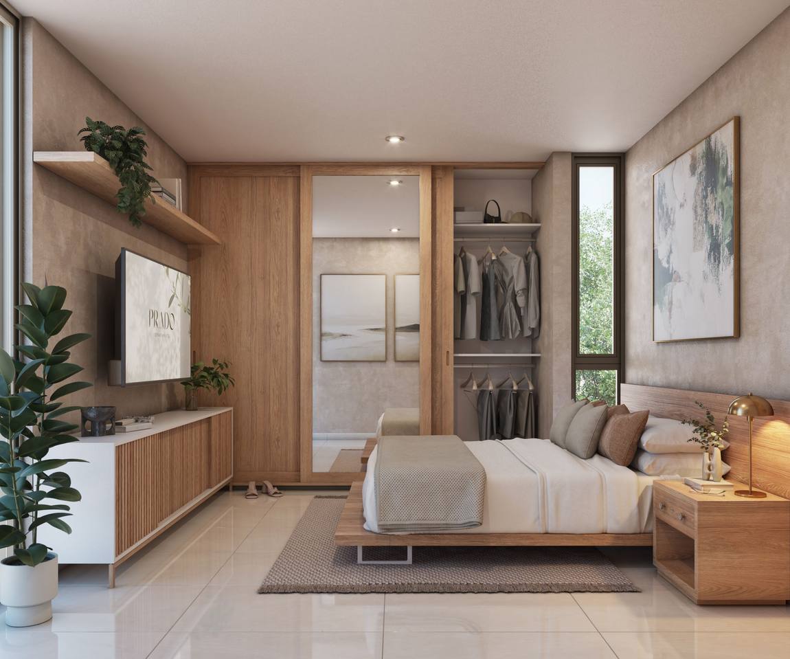 Recámara con clóset vestidor y acabados en madera clara.
